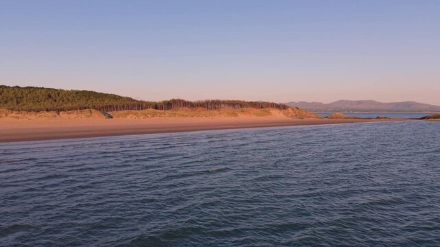 Llanddwyn Island Coastline at Sunset on Anglesey in Wales