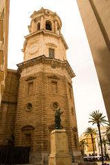 Cádiz Cathedral bell tower framed by historic buildings in the old town of Cádiz, Spain © JoseManuel
