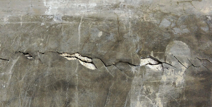 Cracked and Damaged Concrete Wall Texture