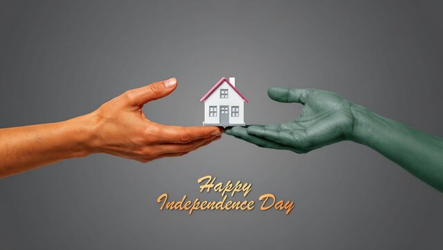 Two hands, one orange one green, offer a miniature house symbolizing shared ownership and unity on Independence Day, representing home and belonging for all citizens.