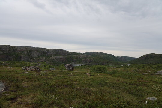Mountain landscape along the Grense Jakobselv river in northern Norway near the Russian border.