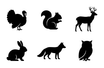Obraz premium Forest Wildlife Silhouettes: Deer, Fox, Owl, Squirrel, Turkey, Rabbit Vector Icons Set, Black Animal Graphics for Nature Themes