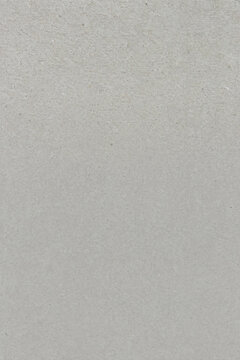 Recycled kraft paper background in cool dove grey with bottom third co