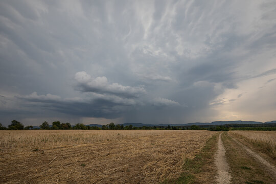 Storm Clouds over Harvested Field near Swabian Alb