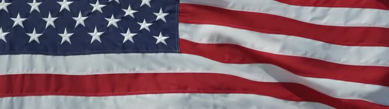 United states flag a symbol of national identity freedom and patriotism waving in the wind.