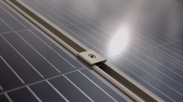 Solar panel middle bracket is an aluminum piece used to lock  two adjacent solar panels onto mounting rails.