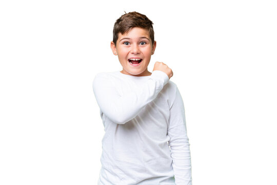 Little caucasian kid over isolated chroma key background celebrating a victory
