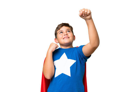 Little caucasian kid over isolated chroma key background in superhero costume and celebrating a victory
