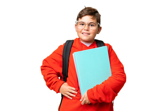 Little caucasian student kid over isolated chroma key background posing with arms at hip and smiling