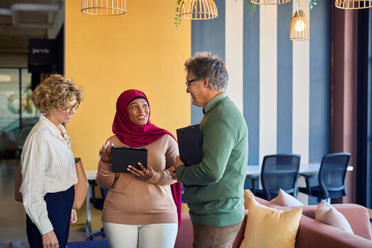 Multiethnic business people talking together