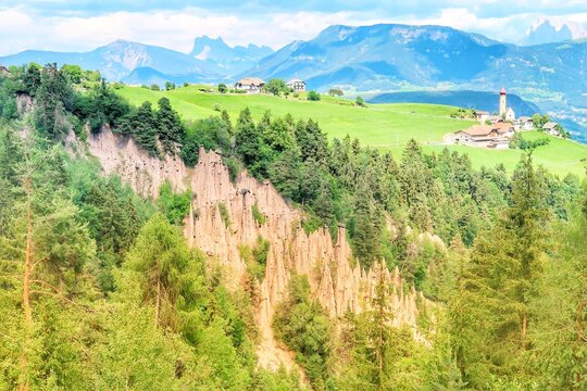 Earth Pyramids of Renon near Collalbo with Dolomites Backdrop, South Tyrol, Italy