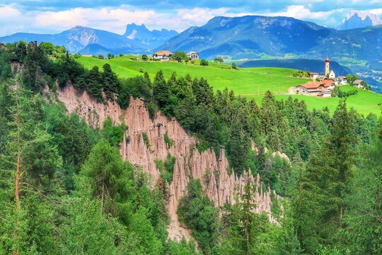 Earth Pyramids of Renon near Collalbo with Dolomites Backdrop, South Tyrol, Italy