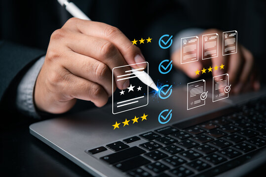 Businessman using stylus for digital document approval quality assurance and five star rating hologram
