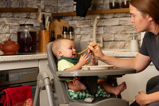 Baby Boy Cries And Refuses Spoon During Feeding