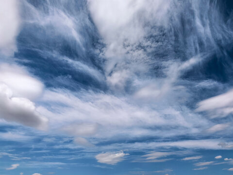 Layered Cirrus Clouds in Vibrant Blue Sky