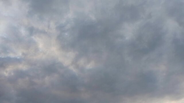 Timelapse bright blue sky with fluffy white clouds