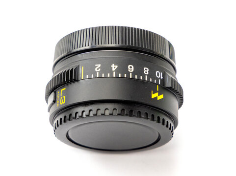 Close up of a black macro extension tube isolated on white