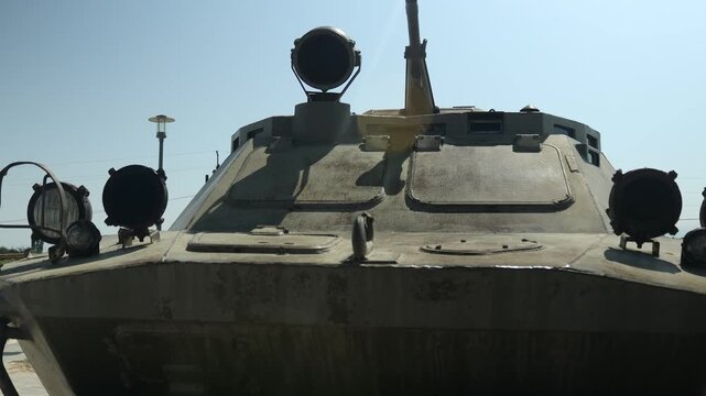 Close-up view of a military vehicle's front end, suitable for use in historical or action-themed projects