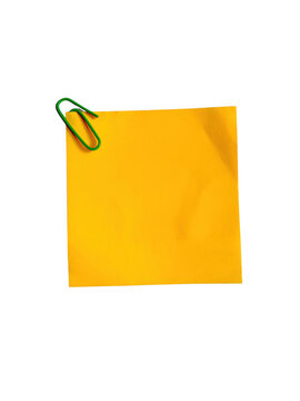 Bright yellow sticky note with green paperclip