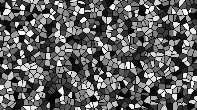 Abstract monochrome pattern featuring an intricate tessellation of irregular polygons in shades of grey, black, and white, creating a dynamic visual texture