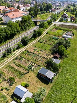 Aerial view of urban farming plots and community allotment gardens on a European city