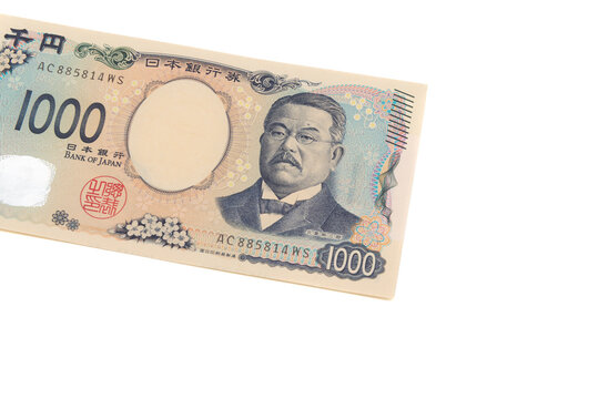 Top view of the front side of a new 1,000 Japanese yen banknote (Series E) featuring Kitasato Shibasaburo. Currency isolated on white background. Finance concepts.