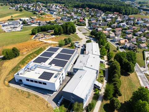 Aerial view of a European town with solar panels installed on rooftops
