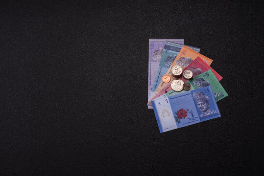Malaysian ringgit banknotes as a tool for trade and financial transactions. The Malaysian ringgit