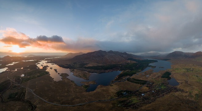 Sunset over Twelve Bens mountain range and lakes in Connemara, County Galway, Ireland