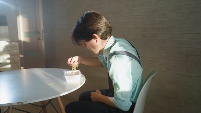 Asian office worker hesitant at table with bowl, cautious reach, bright window light, tentative pick and inspect, pause and refusal gesture, quiet interior tension, lunchtime solitude