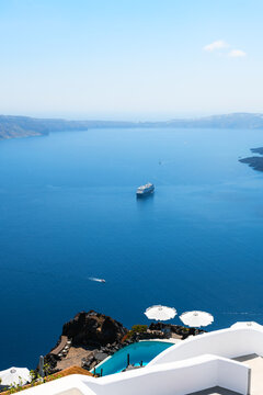 White architecture in Santorini island, Greece. Beautiful terrace with sea view at sunny day.