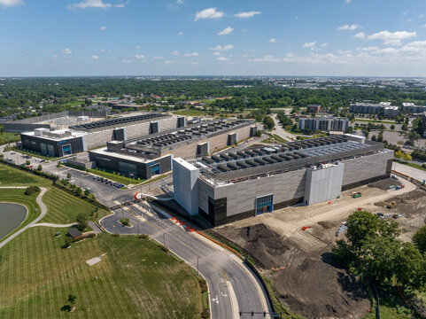 Wide aerial perspective of NTT Global Data Center campus and technology infrastructure