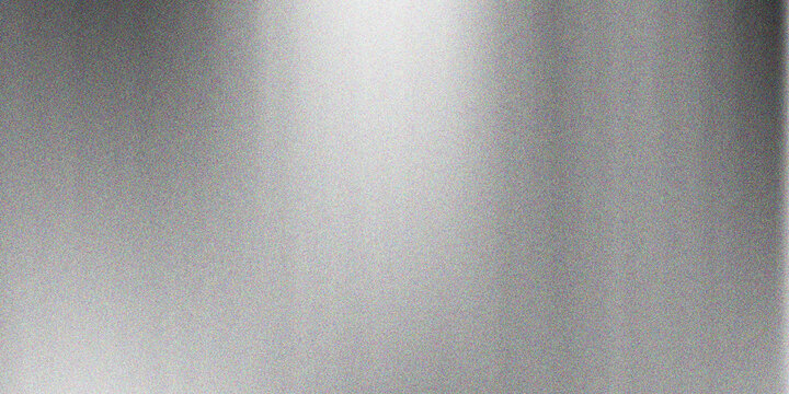 Close up of brushed metal surface with subtle texture and gradient lighting