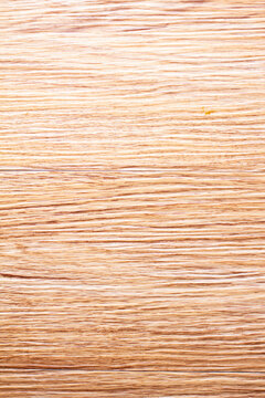Smooth wooden surface with natural patterns and textures in well-lit setting