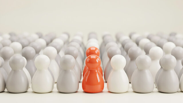 Orange wooden figure standing out in a line among white figures