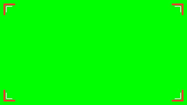 A bright green screen background with white and red corner frame markers