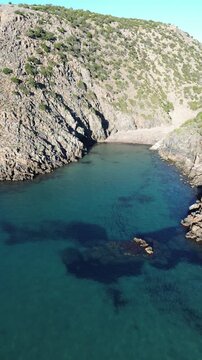 Aerial Drone View of Cala Domestica in Winter With Rough Sea