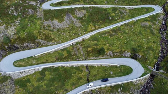 Aerial Drone View of Cars on Winding Serpentine Road at Vestkapp, Norway