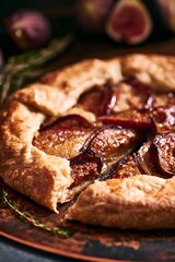 Fototapeta premium Rustic fig galette with blistered figs