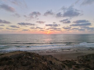 Obraz premium Ocean sunset from coastal cliffs