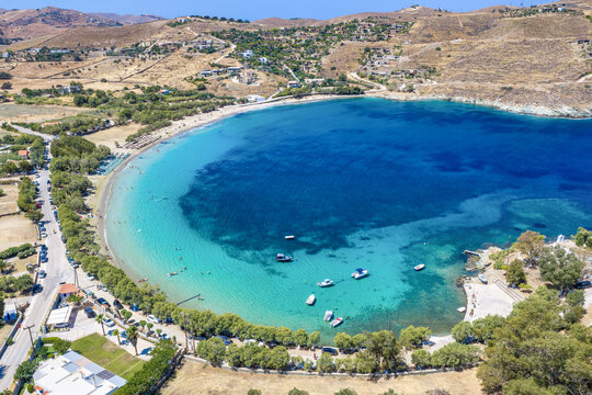 Panoramic aerial summer day view of the bay and beach of Otzia, Kea Tzia Island, Greece, with turquoise sea