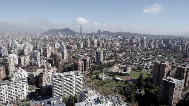 Aerial View Of Santiago De Chile With San Cristobal Hill And Skyscraper Skyline