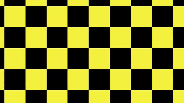 Checkered pattern design in yellow and black colors on a flat surface