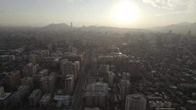 Aerial Drone Forward Flight Toward City Hill In Santiago De Chile At Sunset