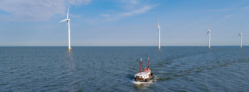 Exploring the beauty of Windmill Park in Flevoland, Netherlands with offshore wind turbines