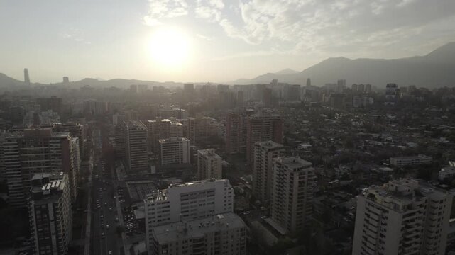 Cinematic Drone View Of Santiago City And Andes Range During Golden Hour