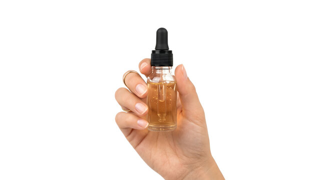 A hand holds a dropper bottle filled with liquid, suggesting beauty or science.