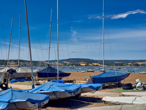 Small Sailboats and Dinghies Parked on Exe Estuary Beach in Exmouth, Devon