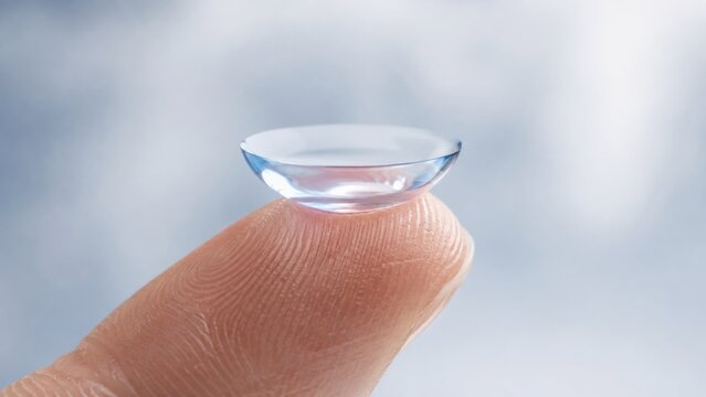 Soft contact lens on fingertip for vision correction