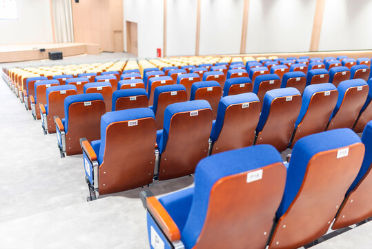 Empty Auditorium with Rows of Chairs for Events